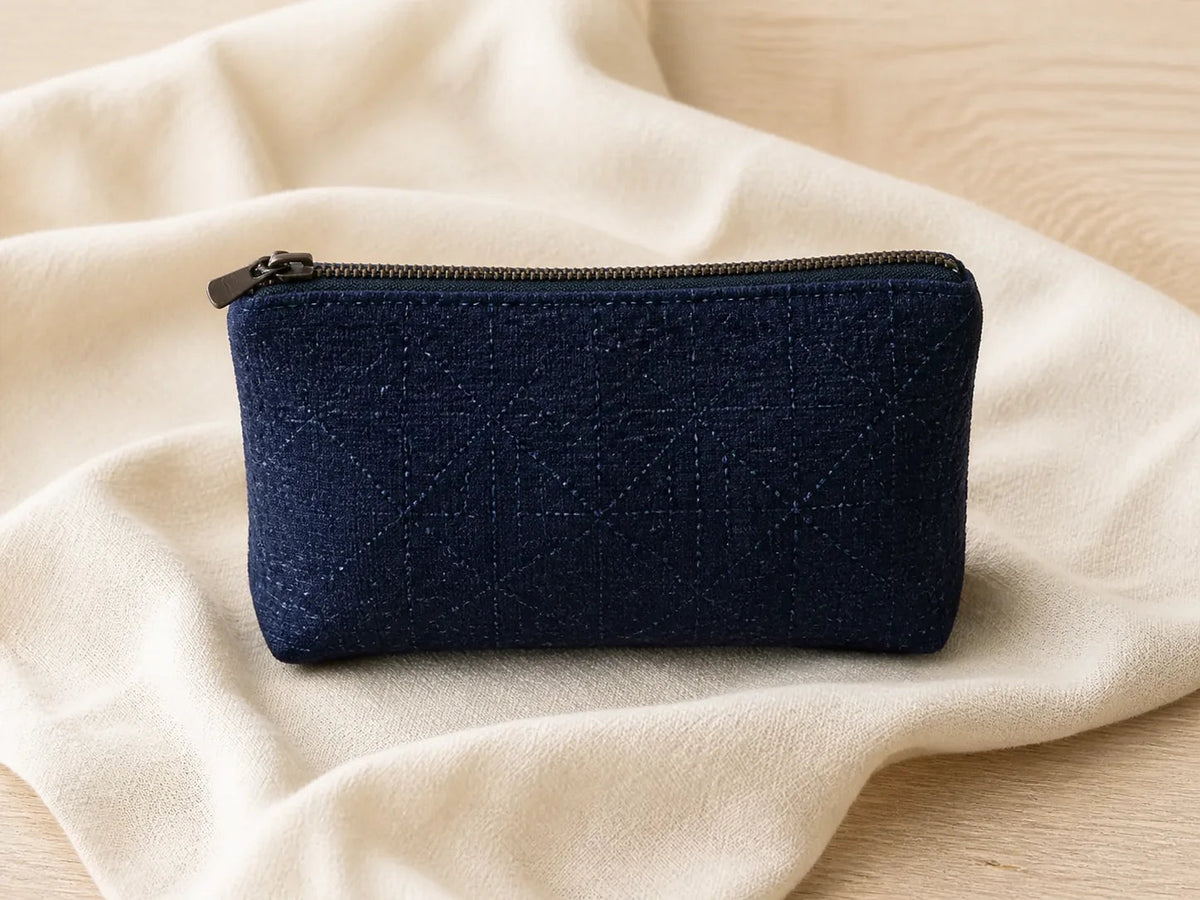 AYRAPORT concept preview of a deep blue pouch on a neutral background